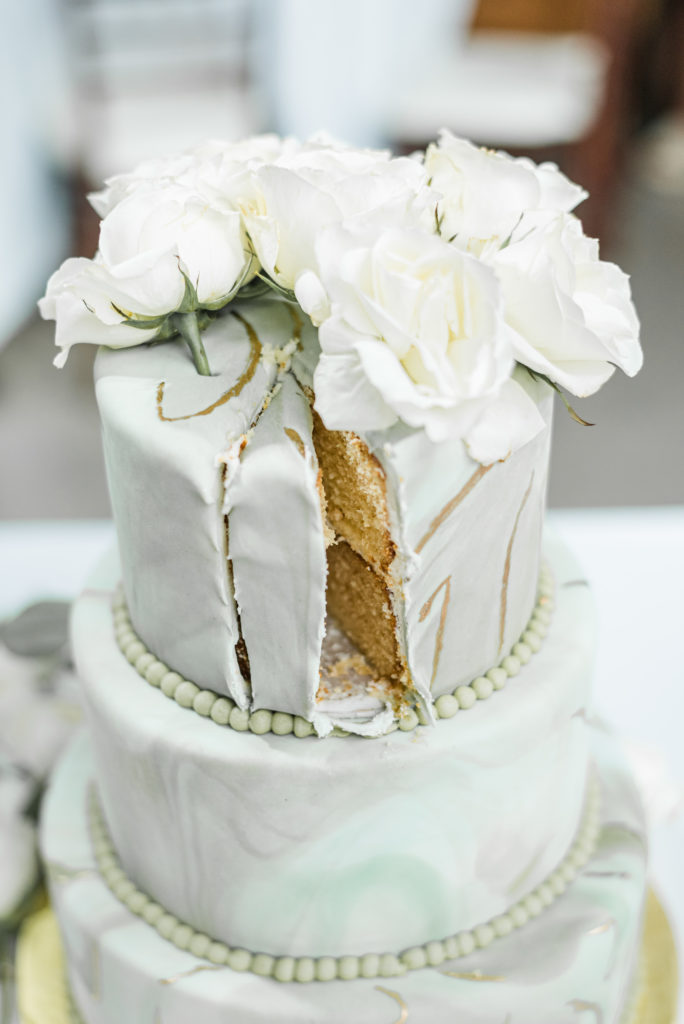 Sliced cake from cake cutting for wedding at White Azalea Estate